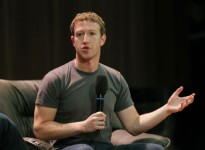 Facebook CEO Zuckerberg gestures as he addresses students at the Moscow State University in Moscow