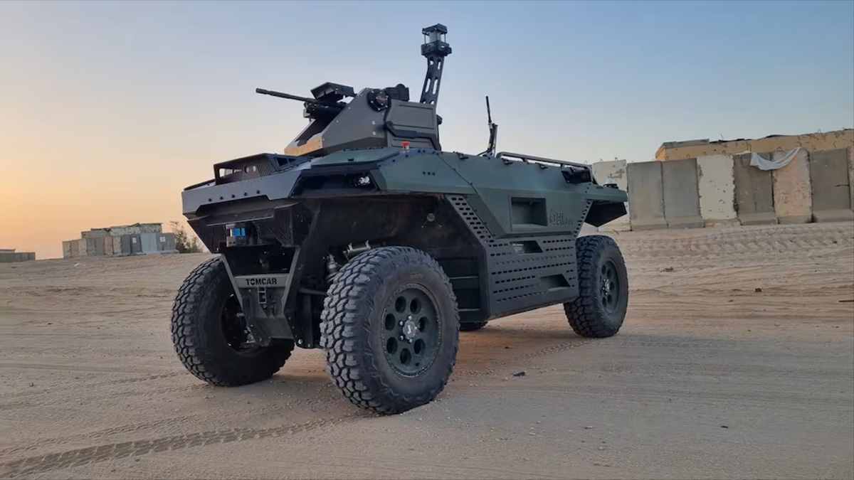 Jaguar Armored wheeled fighting vehicle with turret mounted gun in a desert training area at sunset