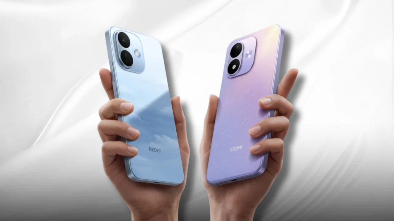 Two Redmi smartphones, one blue and one lavender, are held by hands against a pale background.